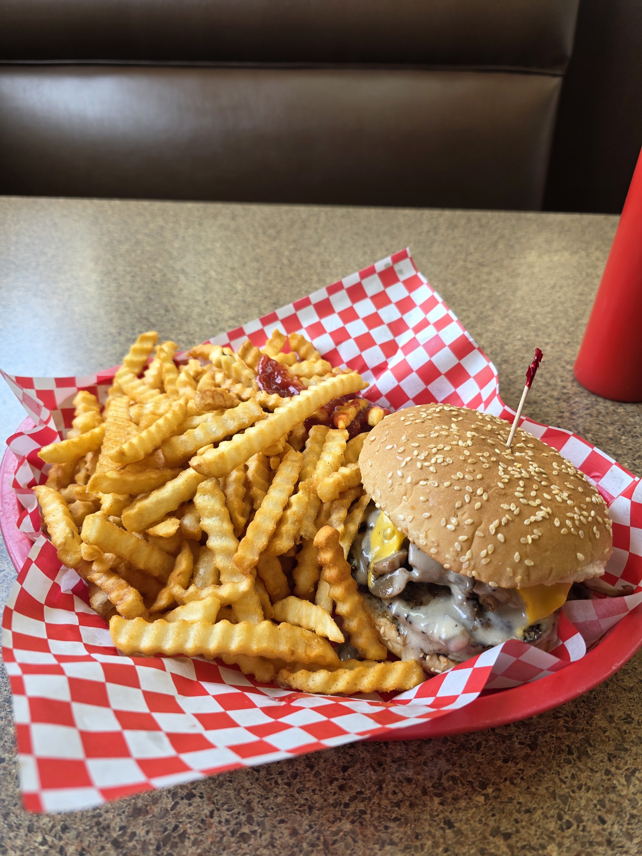 Our mushroom burger and crinkle-cut fries.